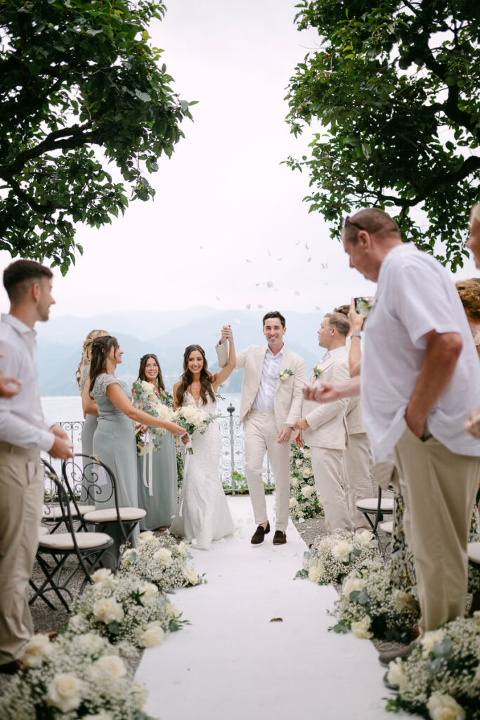 Couple walking down aisle after ceremony