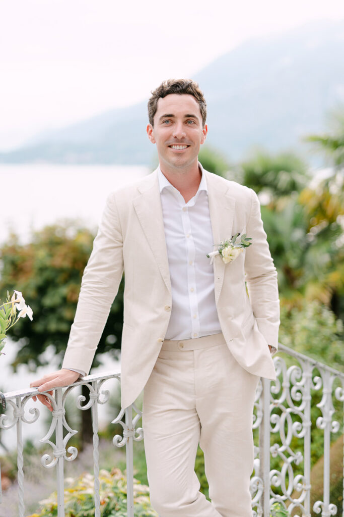 groom potrait overlooking Lake como