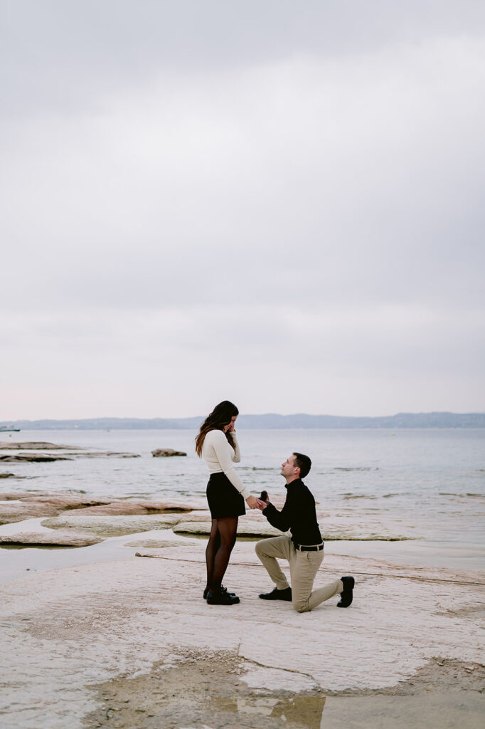 Lake Garda marriage proposal photography near Verona, with a couple by the water