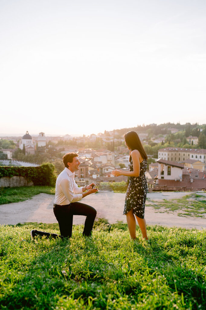 Verona marriage proposal photography at sunset with a couple overlooking the city